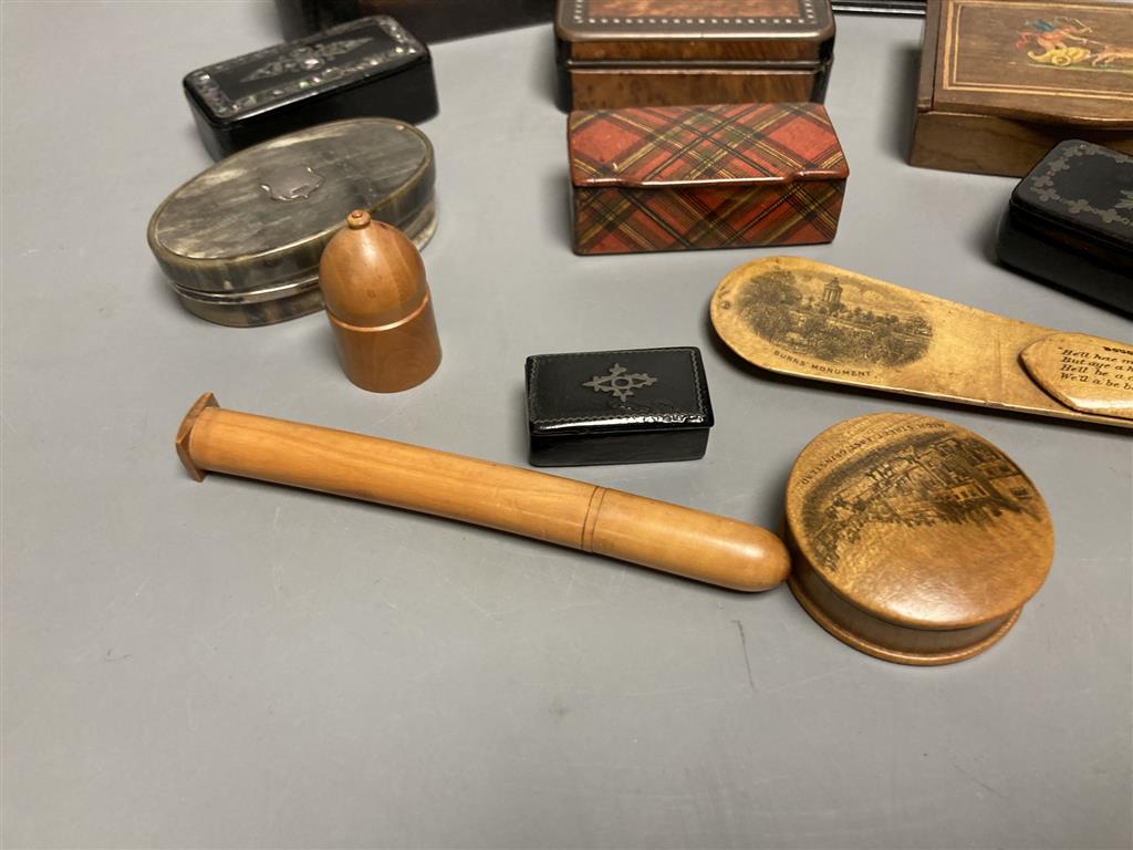 A collection of snuff boxes, mostly 19th century, including horn, tartan, mauchline, black papier mache and other treen